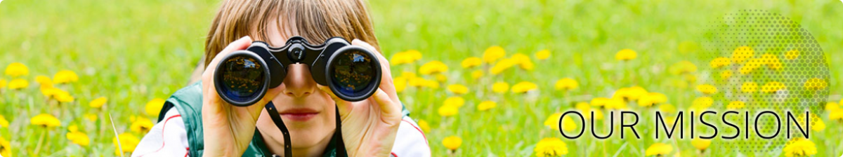 Little boy using binoculars to look for mosquitoes and other bugs in nature.